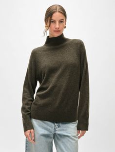 Nothing delivers cold-weather coverage better than a cozy standneck. Made from soft cashmere, this modern take on a classic features a relaxed fit that slightly tapers at the high waist, and slim sleeves. Style it by day with jeans and ballet flats, then switch to a skirt and heels at night. Details Relaxed fit. Long sleeve. Length in size small is 25". The model is 5'11 1/2" and is wearing a size small. 100% Cashmere. Hand wash cold or dry clean. Do not twist or wring. Reshape and lay flat to d Casual Everyday Turtleneck For Fall, Relaxed Fit Turtleneck For Fall Workwear, Casual Winter Turtleneck For Everyday, Casual Cashmere Turtleneck With Ribbed Collar, Casual Cashmere Turtleneck For Work, Cashmere Travel Wrap, Jeans And Flats, Sleeves Style, Cashmere Yarn