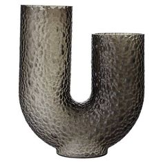 a large metal pipe shaped like the letter u