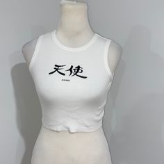 Shein White Y2k Cropped Chinese Symbol Angel Ribbed Crop Tank Top. Size Small. Brand New (Shein Doesn’t Attach Tags) Bundle Together With Other Items For A Huge Discounted Offer White Letter Print Crop Top Tank, White Cropped Tank Top For Streetwear, White Y2k Tank Top With Letter Print, White Stretch Tank Top With Letter Print, White Cropped Tank Top With Graphic Print, White Letter Print Crop Top For Spring, White Crop Top For Spring Streetwear, White Y2k, Y2k Crop Top