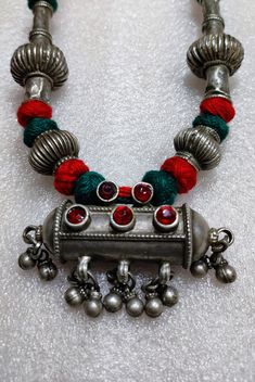 Handmade Vintage Rare Real Old High Grade Silver Beads Dangle  Ethnic Tribal Banjara Adjustable Cotton Thread Necklace Rajasthan Tribal Banjara Jewelery 26 inches longer Adjustable New cotton Threaded Necklace. Made By someone else. Discovered and collect by me from a small tribal banjara village of Rajasthan. Primary Color of Necklace is vintage Silver, Pre- Owned, Old looks. Weight of Necklace is 60.5.gms Pendant Width is 6.5cm Pendant Height of is 3.5cm It's a totally Handmade vintage tribal Bohemian Kundan Necklace With Latkans For Festivals, Bohemian Necklaces With Motifs For Diwali, Traditional Temple Necklace With Tilla For Festival, Traditional Red Temple Necklace With Latkans, Traditional Temple Necklace With Latkans For Festivals, Bohemian Temple Necklace For Navratri Celebration, Bohemian Temple Necklace For Celebration, Bohemian Style Kundan Necklace With Cutdana For Ceremonial Occasion, Traditional Necklace For Diwali Festival