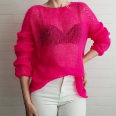 Knitted gossamer in Italian blend (mohair and polyamide).Soft to the body and absolutely no seams!Boat neckline. Free cut, raglan sleeve.In this web you will be irresistible!Can be worn with a bra, top or tank top.Suitable for size M (model size S, height 168 cm).The color is bright pink.Due to different phone screen settings, colors may not be 100% correct. Pink Stretch Knit Sweater, Fitted Pink Mohair Sweater, Stretch Pink Knit Sweater, Fitted Pink Open Knit Sweater, Pink Knit Party Sweater, Pink Knit Sweater For Party, Pink Hand Knitted Long Sleeve Tops, Hand Knitted Long Sleeve Pink Tops, Hand Knitted Pink Mohair Sweater