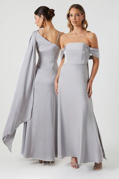 two women in grey dresses standing side by side, one is wearing an off the shoulder dress