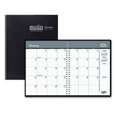 a black and white appointment book with the calendar on it, next to a spiral bound planner