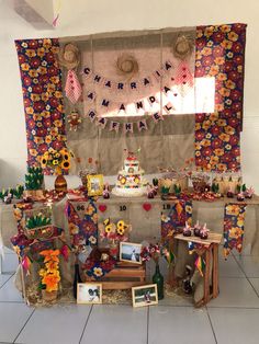 the table is decorated with flowers and decorations