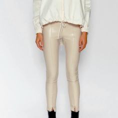 Zara Faux Leather Leggings Ecru Color. Medium: 13” Waist Xl: 16” Waist Small Flaw. See Pictures. Mid Waist Leggings With Invisible Zip At The Hem. Metal Zip Fastening At The Side. Smoke Free, Pet Free Space. Spring Closet Sweep. Offers Accepted. Enjoy! Cream Stretch Bottoms For Fall, Trendy Stretch Cream Pants, Stretch Cream Pants For Winter, Trendy Cream Stretch Pants, Cream Stretch Pants For Winter, Chic Beige Leather Bottoms, Spring Leather Stretch Bottoms, Spring Stretch Leather Pants, Chic Beige Leather Pants For Work