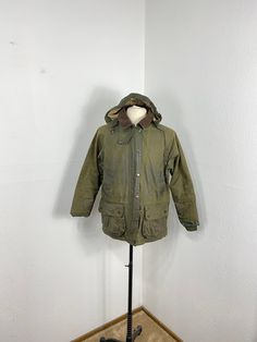 "vintage distressed barbour oiled cotton jacket. nice distressed looking. good distressed vintage condition,showing heavy wear. MEASUREMENTS chest(pit to pit)： 24\" length： 29.5\" all measurements are taken with the garment flat on the ground. feel free to ask me any questions and I'll assist you with my all pleasure. thx for viewing my shop." Vintage Cotton Utility Jacket For Outdoor Activities, Vintage Hooded Utility Jacket For Fall, Vintage Cotton Outerwear For Outdoor Activities, Winter Cotton Utility Jacket For Hunting, Vintage Parka For Fall Outdoor Activities, Vintage Parka For Outdoor Activities In Fall, Vintage Cotton Utility Jacket For Outdoor, Vintage Utility Jacket For Hunting In Fall, Vintage Cotton Parka For Fall