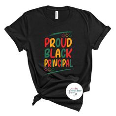 Show your appreciation for the admin in your school with this Proud Black Principal Tee from our Principal Appreciation Collection. Featuring a comfortable fit and a message designed to express your school spirit. Put this on and make a difference today! ▶Bella and Canvas Brand Shirts ▶Unisex adult sizing ▶Rolled sleeves in pictures for styling purposes only ▶True to size Black T-shirt For Back To School, Black Text Print Top For Back To School, Black Crew Neck T-shirt For School Spirit, Black Cotton T-shirt For Back To School, Back To School Black Graphic T-shirt, Teacher Appreciation School Spirit T-shirt, Slogan Tops For College Back To School, Slogan Tops For College And Back To School, Back To School Black Cotton Tops