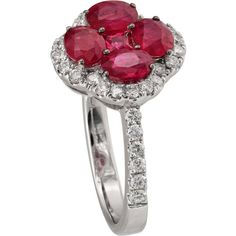 A stunning piece from Ruchi New York, the Clover Ruby Ring is a must-have for any fine jewelry collection. Featuring 1.94 carats of rich, red rubies surrounded by .51 carats of sparkling, brilliant-cut diamonds, this ring is a true showstopper. The 18k white gold band provides the perfect backdrop for the vibrant gems, and the unique clover design adds a touch of whimsy to this sophisticated piece. Whether you're buying for yourself or as a gift for a loved one, the Clover Ruby Ring is sure to i Clover Design, White Gold Band, Fine Jewelry Collection, Ruby Ring, Gold Band, Brilliant Cut Diamond, Diamond Rings, Jewelry Collection, Ruby