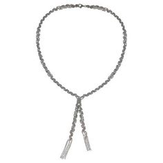 In a design reminiscent of the fancy dress jewelry of yesteryear Thai artisan Angels crafts this singular necklace. The lariat-style necklace is crafted from sterling silver ball chain that is woven in intricate patterns and culminates in gleaming silver fringe ..925 Sterling silver Silver Adjustable Long Lariat Necklace, Adjustable Silver Lariat Necklace, Silver Lariat Necklace With Adjustable Chain For Party, Adjustable Silver Lariat Necklace With Long Drop, Silver Adjustable Lariat Necklace, Silver Lariat Drop Necklace For Party, Silver Chain Lariat Necklace, Silver Chain Lariat Necklace For Party, Silver Chain Metal Lariat Necklace