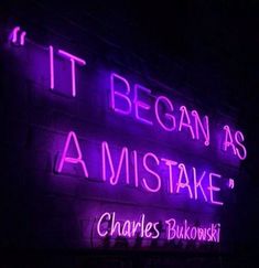 a purple neon sign that says it began as amistake