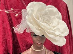 Ready to ship today from TN, USA! I ship quickly and package safely in boxes. Follow this link for more beautiful choices at my Etsy shop https://www.etsy.com/shop/equineelan This lightweight and gorgeous fascinator hat has a HUGE BOW of WHITE dotted tulle and long strands of faux pearls for a Stunning and Original Look!  Classic but Couture! A true Kentucky Derby Original.  The Hat FLOWER is True White.  Tulle Ribbon is White.  Flower measures 18 inches by 18 inches. With bow and pearl strands Wild Rose Flower, Big White Flowers, Victorian Tea Party, Royal Ascot Races, Ivory Fascinator, Tulle Ribbon, Kentucky Derby Fascinator, Bridal Tea Party, Hat Flower