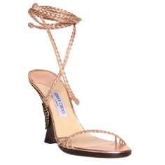 Metallic Pink Copper Color Leather Braided Sandals With Open Front And Lace Up Ankle Long Straps. The Dark Brown Wood Wedges Are Enriched By A Bronze Medallion And The Copper Leather Strings Before They Braid. Vero Cuoio. Made In Italy. Heel 4.75". Luxury Open Heel Wedge Sandals With Heel Strap, Luxury Summer Wedge Sandals With Wrapped Heel, Luxury Ankle Strap Wedge Sandals For Beach, Luxury High Heel Wedge Sandals With Wrapped Heel, Luxury Evening Wedge Sandals For Summer, Luxury Wedge Sandals With Wrapped High Heel, Luxury Wedge Sandals With Wrapped Heel, Luxury Wrapped Heel Wedge Sandals, Luxury Wedge Heel Sandals With Heel Loop