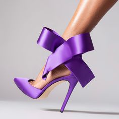 Step into elegance with these Elegant Purple Ankle Strap Bow Heels. Designed with a pointed toe and satin finish, these pumps are perfect for weddings and special occasions. Material: Satin Color: Purple Heel Type: stiletto heel Heel height: 4.72" / 120 mm approx Product measurements were taken using size 8. Please note that measurements may vary by size. Toe: Pointed toe Bow embellishment The ankle strap design makes it easier to wear. Handcrafted US sizing. Fits true to size. Purple Heels, Bow Pumps, Bow Sandals, Bow Heels, Stiletto Shoes, Purple Satin, High Heels Stilettos, Handbag Shoes, Party Shoes