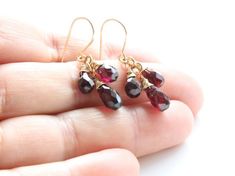 Garnet earrings Gold filled earrings deep red gemstone | Etsy Cluster Earrings As A Gift, Red Cluster Earrings Gift, Ruby Cluster Jewelry Gift, Gemstone Dangle Cluster Earrings As Gift, Red Gemstone Cluster Earrings For Gift, Handmade Elegant Garnet Earrings, Elegant Garnet Gemstone Earrings, Faceted Garnet Drop Earrings, Gold Garnet Faceted Earrings