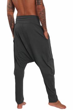 The Harlem Mens Harem Pants have a stretchy quality that allows for total freedom of movement for everything from sleeping to yoga class. Our eco friendly, Tencel fabric is breathable, moisture wicking and super soft. Somehow it magically gets even softer with each wash too! Thanks to their easy, pull on styling you will reach for them time and time again. FEATURES: Wide, folded over forgiving waistband for a comfortable and second skin feel Drop crotch style Tapered leg Wear them long or pulled Mens Harem Pants, Grey Lounge, The Shins, Tencel Fabric, Streetwear Shop, Pants For Men, Steel Grey, Sustainable Fabrics, Yoga Class