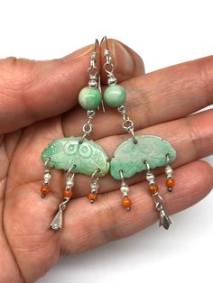 A pair of dangling earrings with beautiful hand carved antique jade, over 100 years old, from Qing Dynasty, A.D.1644-1912, complemented by antique jade beads, antique coral beads, over 100 years old and pearl beads. These two antique carved jade are valuable and collectable items. As they are so beautiful, I decided to turn them into earrings. This is really elegant and one of a kind! The antique carved jade in these earrings are in excellent condition. - made with natural colour antique jade (o Antique Chinese Jewelry, Chinese Earrings, Antique Accessories, Chess Boards, Antique Jade, Chinese Jewelry, Asian Jewelry, Carved Jade, Earrings Antique