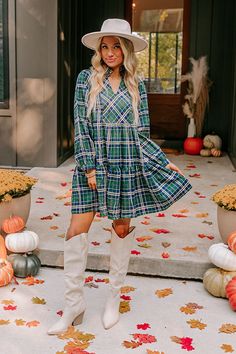 - Stay sweetly styled in this adorable plaid mini dress! From apple picking at the orchard to festive seasonal events, this darling dress will keep you looking cute. - Unlined plaid material featuring cream, ivory, yellow and navy - A built-in lining - A v-cut neckline with a ruffled back - Long sleeves with button closure cuffs - Hidden side pockets - A relaxed silhouette that ends in a mini dress length hemline Plaid Mini Dress, Plaid Material, Concert Fashion, Essential Dress, Darling Dress, Teacher Style, Apple Picking, Knee High Leather Boots, Curve Dresses