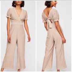 Nwot Free People Boundary Striped Jumpsuit. Faux Wrap V-Neck Bodice Short Puff Sleeves With Elastic Hidden Side Zipper Self-Tie Back With Triangle Keyhole 100% Cotton, Lightweight And Slightly Textured Stripe. Fabric Is Semi-Sheer -But Lined In The Legs & Bodice. Inseam 26" Leg Opening 12" Beige V-neck Jumpsuit For Day Out, Beige V-neck Jumpsuits And Rompers For Loungewear, Beige V-neck Jumpsuits And Rompers For Day Out, Beige V-neck Jumpsuit For Loungewear, Chic Beige Jumpsuits And Rompers For Spring, Chic Cream Jumpsuits And Rompers For Loungewear, Chic Beige Jumpsuits And Rompers For Brunch, Chic Beige Jumpsuits For Brunch, Beige Jumpsuits And Rompers For Spring Brunch