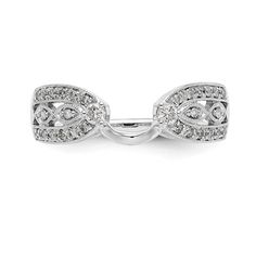 a white gold ring with diamonds on the sides and an oval design in the middle