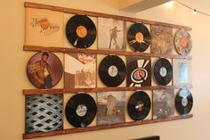 a wall with many records on it