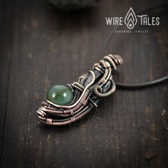 Wire wrapped bohemian style copper necklace pendant with natural Moss agate gemstone. Copper was oxidized to create antique look and to highlight the details of the wire work. It is a unisex necklace so it fits both men and women. This copper necklace comes with brown waxed cotton cord which has adjustable sliding knot and it can easily be adjusted to your preferred length. This necklace was made out of natural copper wire, so it is going to get darker over the time, but no worries, it is easy t Vintage Wire Wrapped Necklace For Healing, Bronze Hand Wrapped Bohemian Necklace, Bohemian Bronze Necklaces With Copper Wire, Bronze Bohemian Necklaces With Copper Wire, Bronze Wire Wrapped Spiritual Necklace, Spiritual Wire Wrapped Bronze Necklaces, Spiritual Bronze Wire Wrapped Necklace, Bronze Spiritual Hand Wrapped Necklaces, Spiritual Bronze Hand Wrapped Necklaces