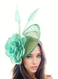 Mint Green Womens Kentucky Derby Fascinator Hat Wedding Sinamay Hats Ladies Ascot Fascinator Headband Feather Headpiece Fancy Cocktail Hats Hats By Cressida Kentucky Derby & Ascot Fascinator Hats Mint Green Gulhi Fascinator Hat Beautiful large mint green satin open flower trimmed with arrowhead quills Base measures about 10 inches wide This mint green headpiece is mounted with a matching headband. If you prefer a headband to match your hair, please make a note at check out what colour headband y Spring Formal Costume Hat With Feathers, Formal Spring Costume Hat With Feathers, Elegant Green Hair Accessories For Kentucky Derby, Spring Feather Headband For Races, Feathered Mini Hats For Church In Spring, Spring Formal Headpiece With Feathers, Spring Evening Costume Hat With Feathers, Summer Feather Headband Fascinator, Spring Wedding Feathered Fascinator