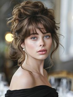 For a more formal look, a Layered Updo with Soft Wispy Bangs offers elegance that’s hard to overlook. This hairstyle fits well with long face shapes and subtle eye colors, ideal for prom nights or elegant dinner parties. Wedding Guest Hairstyles For Long Hair With Bangs, Whispy Updo, Prom Hairstyles Bangs, Hair Styles For Wedding Party, Formal Updo With Bangs, Bridal Hairstyles With Bangs, Wedding Updo With Bangs, Bridal Hair With Bangs, Wedding Hair With Bangs