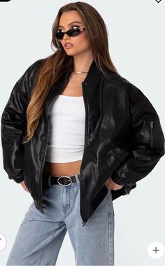 Make a bold statement with this Edikted faux leather oversized bomber jacket in black. The jacket features a zip closure, long sleeves, and a comfortable oversized fit. The outer shell material is made of high-quality faux leather, ensuring a stylish and durable look. This jacket is perfect for any occasion and can be hand washed easily to maintain its quality. The black color and bomber jacket style make it a versatile addition to any wardrobe. It is available in size large and is designed for Cheap Biker Style Jacket For Streetwear, Cheap Spring Biker Jacket For Streetwear, Hailey Bieber Jacket Outfit, Black New York Jacket, Over Size Black Leather Jacket, Cheap Biker Jacket For Streetwear, Adidas Faux Leather Jacket, Winter Jacket Inspiration, Outfits With Black Jacket