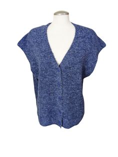 This women's cardigan sweater vest is perfect for a casual occasion. The relaxed fit and boxy stretch make it comfortable to wear, while the solid pattern and minimalist design give it a classic look. It comes in a beautiful blue color and is made of a blend of polyester, spandex, alpaca, wool, and acrylic materials, ensuring that it is soft and durable. The sleeveless design and knit fabric type make it perfect for the winter, fall, and spring seasons. This sweater is branded by Contemporaine and is available in size L, with a regular size type for women. It is recommended to hand wash only to maintain its quality. Get this fuzzy grandma-inspired sweater and add a touch of minimalism to your wardrobe today! Measurements (approximate, laid flat, one side, double to go all way around where Blue Knit Vest For Fall, Blue Knit Sweater Vest For Fall, Trendy Blue Knit Vest, Blue Sweater Vest For Fall, Blue Knit Sweater Vest For Layering, Trendy Blue Winter Vest, Casual Blue Knit Vest, Blue Sweater Vest For Workwear, Spring Season, Blue Sweater Vest For Spring Workwear