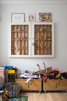 a room filled with lots of clutter and toys