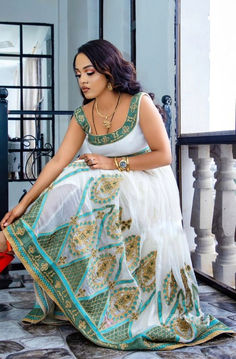 The Habesha dress, also known as Habesha Kemis, is an exquisite example of Ethiopian traditional dress. Perfect for weddings, this stunning attire features a delicate beaded design in light colors, showcasing the elegance and cultural heritage of Ethiopia. Ethiopian Dress, Habesha Kemis, Shipping Company, Ethiopia