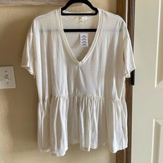 New Urban Outfitters Size Medium Truly Madly Deeply Babydoll Oversized Top Cream Color Deep V Neck Lightweight, Somewhat See Through Off White V-neck Top For Day Out, Off White V-neck Top For Daywear, White Summer Top For Loungewear, Oversized White V-neck Top, White Oversized Tops For Day Out, V-neck Ruffled Tops For Loungewear, White Ruffled Tops For Loungewear, Oversized Ruffled Tops For Summer, Off White Spring Loungewear Top