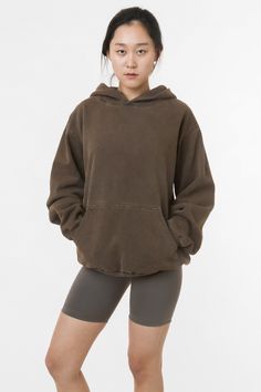 Made from a luxurious 14oz fleece, this hoodie is incredibly soft and warm, yet still breathable and moisture-wicking. The loose fit allows for a full range of motion, making it perfect for everything from running errands to lounging around the house. The kangaroo pocket provides ample storage for your essentials, while the ribbed cuffs and hem keep the cold out. This hoodie is Garment Dyed. Our garment-dyed hoodies are dyed after they're sewn, which gives them a more durable and even color, inc Los Angeles Apparel, Garment Manufacturing, Brown Hoodie, Outfit Vintage, Sweatsuit Set, Sweat Hoodie, Vintage Hoodies, Cool Hoodies, Sweaters And Leggings