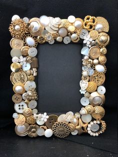 the letter u is made up of buttons and other things