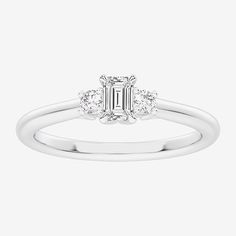 Ring Style: 3-Stone Rings, Side Stone Rings, Promise RingsDiamond Clarity: Si1-Si2Setting: Multi-SettingStone Cut: EmeraldStone Millimeter Measurement: 3 Mm Width, 4 Mm LengthDiamond Color: G-HMetal Color: WhiteCenter Stone Weight: 1/5 Ct.Ring Gallery Height: 5mmRing Top Width: 3.7mmRounded Carat Weight: 1/3 Ct. T.w.Band Width: 2mmCare: Wipe CleanStone Type: 7 Lab Grown DiamondAuthenticity: Lab Grown DiamondMetal: Sterling SilverCountry of Origin: Imported Classic Three Stone Emerald Promise Ring, Classic White Three Stone Rings, White Emerald Cut Three Stone Ring, Classic Three Stone Crystal Promise Ring, White Three-stone Round Band Rings, White Three Stone Diamond Ring Fine Jewelry, White Three Stone Round Band Rings, Classic White Three Stone Jewelry, Classic White Three-stone Jewelry