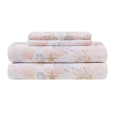 three sheets with shells and starfishs on them in pink, white and gold