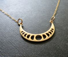 Natural golden bronze moon charm showing each phases. 14k gold filled fine chain. also available in sterling silver and vermeil/14kgf(last pic) Celestial jewelry Moon charm-33x16.5mm to go back to the main shop-NYMETALS-ETSY-click here https://www.etsy.com/shop/nymetals all celestial jewelry https://www.etsy.com/shop/NYmetals/search?search_query=celestial&order=date_desc&view_type=gallery&ref=shop_search Pyrography Jewelry, Gem Necklaces, Diamond Circle Necklace, Moon Phases Necklace, Diamond Choker, Circle Diamond, Gold Diamond Necklace, Celestial Jewelry, Moon Jewelry