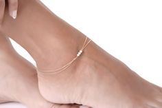 This Boho foot bracelet is a fine jewelry piece, made of solid gold, and is set with natural pearls. A natural pearl anklet, perfect for any occasion! It is classic and modern at the same time! The color of the pearls is white and the shape is round. ✔ Made to Order ✔ Gold Kt: 9k-14K-18k ✔ Metal stamp: 375-585-750 ✔ Available Gold Color: Rose Gold, Yellow Gold, White Gold ✔ Gemstone: Natural Pearl ✔ Stone Cut: Round ✔ Number of Stones: 3 ✔ Setting Type: Soldered with gold ✔ Stone Size: 3 MM appr Gold Anklets With Pearl Charm As Gift, Gold Anklets With Pearl Charm For Gift, Dainty Gold Anklets With Pearl Charm, Gold Dainty Anklets With Pearl Charm, Dainty Pearl Gold Anklets, Gold Pearl Anklets As Gift, Gold Pearl Anklet With Pearl Charm, Delicate Pearl Chain Anklets, Gold Pearl Anklets For Gift