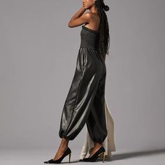 Size Xs Black By Anthropologie Faux Leather Balloon Jumpsuit. Nwt. - Polyurethane-Coated Viscose, Elastane - Side Slant Pockets - Pull-On Styling - Machine Wash Dimensions - 14" Rise - 26" Inseam - 7" Leg Opening Chic Faux Leather Jumpsuits And Rompers For Night Out, Fitted Faux Leather Jumpsuits And Rompers For Party, Chic Black Faux Leather Jumpsuits And Rompers, Faux Leather Jumpsuits And Rompers For Party, Black Faux Leather Jumpsuits And Rompers For Night Out, Black Fitted Leather Jumpsuits And Rompers, Black Leather Jumpsuits And Rompers, Fitted Faux Leather Jumpsuits And Rompers For Fall, Black Leather Fitted Jumpsuits And Rompers