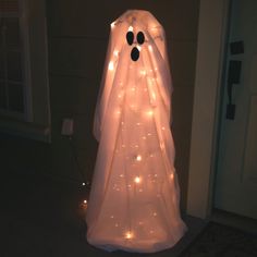 a ghost made out of plastic with lights on it