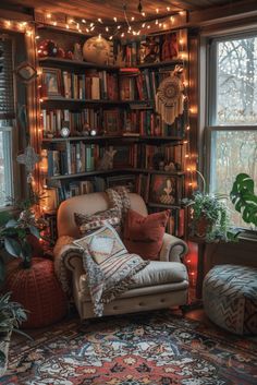 a living room filled with lots of furniture and bookshelves covered in christmas lights