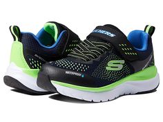 SKECHERS KIDS Sport - Ultra Groove 403847L (Little Kid/Big Kid) - Boy's Shoes : Navy/Black : Waterproof and comfortable, the SKECHERS KIDS Sport - Ultra Groove 403847L sneakers offer a sporty look and are suitable for all weathers. Textile and synthetic upper. Textile lining. Cushioned insoles for added comfort. Adjustable hook-and-loop closure on the instep with stretch lace panels. Round toe with synthetic trims. Pull tab on the back. Allover contrasting design. Branding detail on the strap an Waterproof Synthetic Sneakers For Sports, Sporty Non-slip Running Shoes For Outdoor, Green Waterproof Running Shoes For Sports, Sporty Waterproof Running Shoes For Streetwear, Casual Waterproof Running Shoes For Streetwear, Green Waterproof Running Shoes With Round Toe, Waterproof Synthetic Running Shoes For Sports, Casual Waterproof Running Shoes, Sporty Non-slip Sneakers For Outdoor Activities