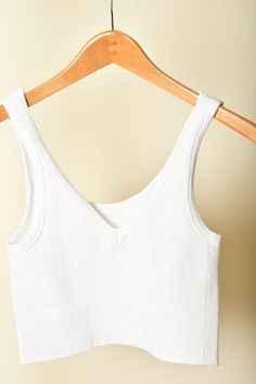 A jb and me fan favorite, these Nikibiki tanks are one-size, but are so stretchy and sturdy! You'll love pairing these tanks with any button up or tee, or wearing them alone! Oh- and they're reversible! Wear it forwards or backwards for a v-neck or a scoop neck, it's up to you! Brand: Nikibiki Content: 92% Nylon | 8% Spandex Wear It, Flutter Sleeve, Herringbone, Scoop Neck, Button Up, Spandex, V Neck, Fan, How To Wear