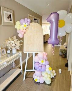 balloons are arranged in the shape of an i love you sign and balloon bouquets