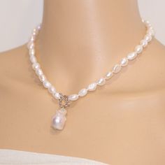 ON SALE The necklace is made of 8mm white color freshwater nugget pearls and 13-15mm white baroque pearl Item No: NK604 Material: freshwater pearls Shape:nugget shape and baroque pearl Size: 8mm and 13-15mm Color: white Luster: good Skin: with flaws Quality: AA clasp :silver 925 with white gold plated or yellow gold plated Hand Knotted: Yes Necklace length: any length can make, Packing: beautiful gift pouch,ready for gift giving Please contact Lisha freely if you have any specific demand or need White Baroque Pearl Lariat Necklace, White Pearl Lariat Necklace With Pearl Drop, White Pearl Charm Lariat Necklace Gift, White Lariat Necklace With Pearl Charm As Gift, White Toggle Necklace With Pearl Chain, White Pearl Drop Lariat Necklace, White Lariat Pearl Necklace With Pearl Drop, Pearl White Lariat Necklace With Pearl Charm, White Toggle Necklace With Pearl Pendant As Gift