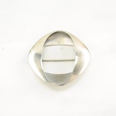 More Unique Sterling Silver Brooches: https://www.etsy.com/shop/SilverStarrs925?section_id=15203699 Beautiful Georg Jensen Silver Brooch This brooch is 1 3/4" inches long It is 1 13/16" inches wide The brooch weighs 9.8 Grams Stone or design featured on this brooch is Modernist 368  The color of the stone or design is  Markings, if any are: Georg Jensen, 925 S, 368, Denmark , (Tested & Guaranteed to be Sterling Silver) Condition of this brooch is Very good, moderate patina, some wear on inside C Contemporary Formal Brooch Jewelry, Modern Formal Jewelry Brooch, Contemporary Silver Brooches For Formal Occasion, Modernist Sterling Silver Brooch, Silver Hallmarked Oval Brooches, Silver Hallmarked Oval Brooch, Silver Oval Hallmarked Brooch, Silver Oval Brooches Hallmarked, Modern Silver Brooch Jewelry