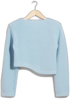 Asymmetrical Knit Sweater For Spring, Spring Ribbed Cashmere Sweater, Blue Ribbed Cropped Sweater For Spring, Blue Ribbed Long Sleeve Cropped Sweater, Spring Ribbed Merino Wool Sweater, Chic Ribbed Merino Wool Sweater, Asymmetrical Sweater For Spring Layering, Spring Textured Knit Merino Wool Tops, Chic Blue Ribbed Sweater