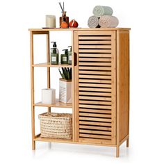 a wooden shelf with towels and other items on it's top, next to a wicker basket