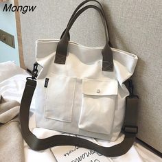 Shipping: Worldwide Express Shipping AvailableDelivery time: 7-15Days Fast ShippingReturns: Fast refund, 100% Money Back Guarantee.Brand Name: GOT-TOGHandbags Type: Shoulder BagsTypes of bags: Shoulder & HandbagsMain Material: CanvasLining Material: PolyesterShape: Casual TotePlace Of Origin: HE BEI ProvincePlace Of Origin: HE BEI  ProvinceOrigin: Mainland ChinaCN: HebeiHardness: SOFTPattern Type: SolidInterior: Interior Zipper PocketInterior: Cell Phone PocketDecoration: NONEExterior: Solid Bag Postman Bag, Casual Tote Bag, Design Moda, Canvas Crossbody Bag, Canvas Bags, Casual Tote, Shoulder Messenger Bag, Shoulder Tote Bag, Shopper Bag