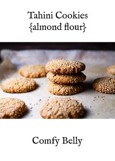 cookies are stacked on top of each other in front of the words, tahini cookies almond flour